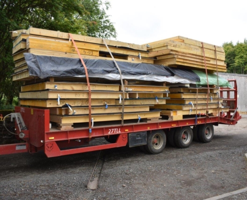 loader carrying wood