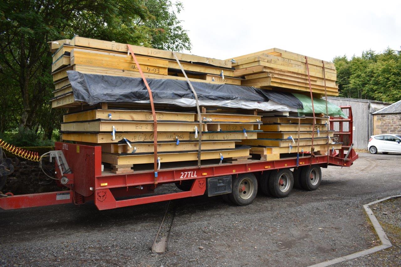 loader carrying wood